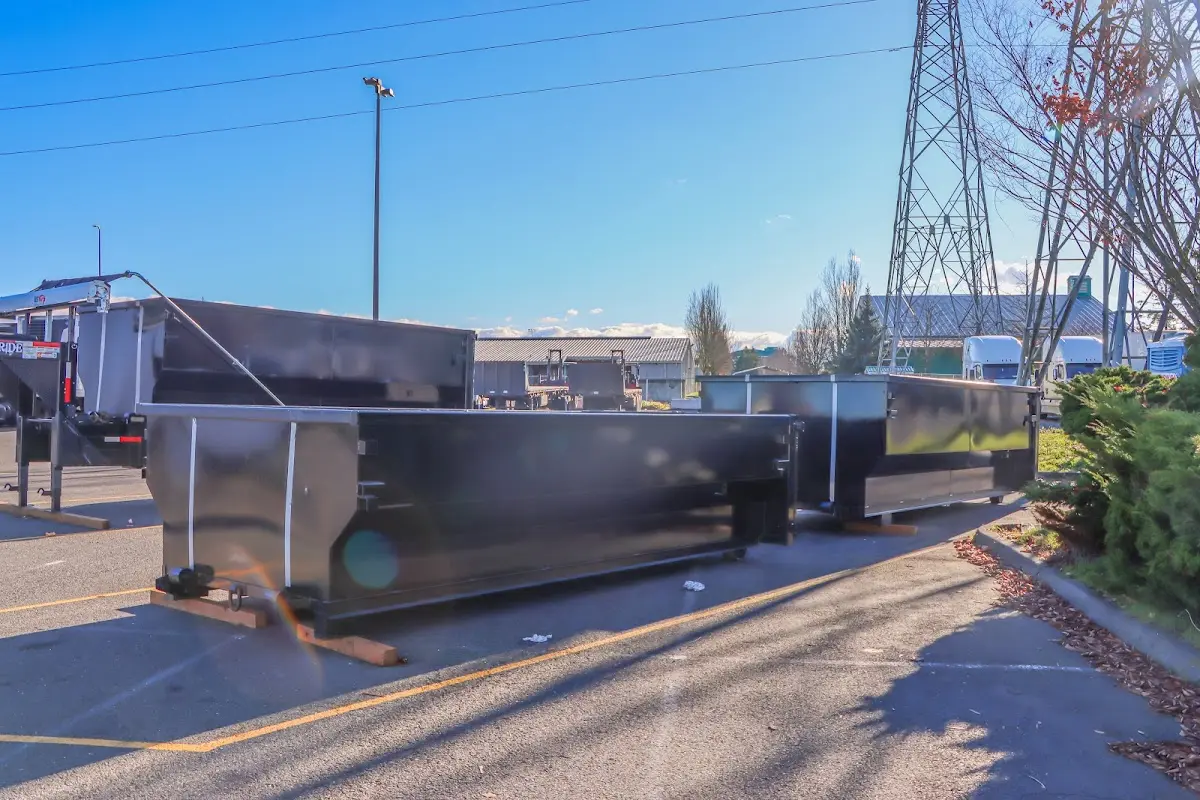Roll-off dumpster ready for waste disposal at job site for Demolition Dumpster Rental in Westview